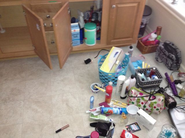 This was not exactly my idea of a good time...but in the end I organized and threw away a bunch of stuff so I didn't mind! You can imagine Alex's face when he walked into this. I assured him that it would be ok! Lol
