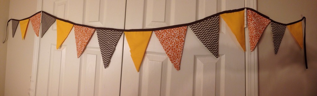 I cannot believe I didn't get a picture of the fabric bunting that we hung above the entrance of the party.  It was so festive!  Click the link to order your's today!  I can make one to match any nursery!