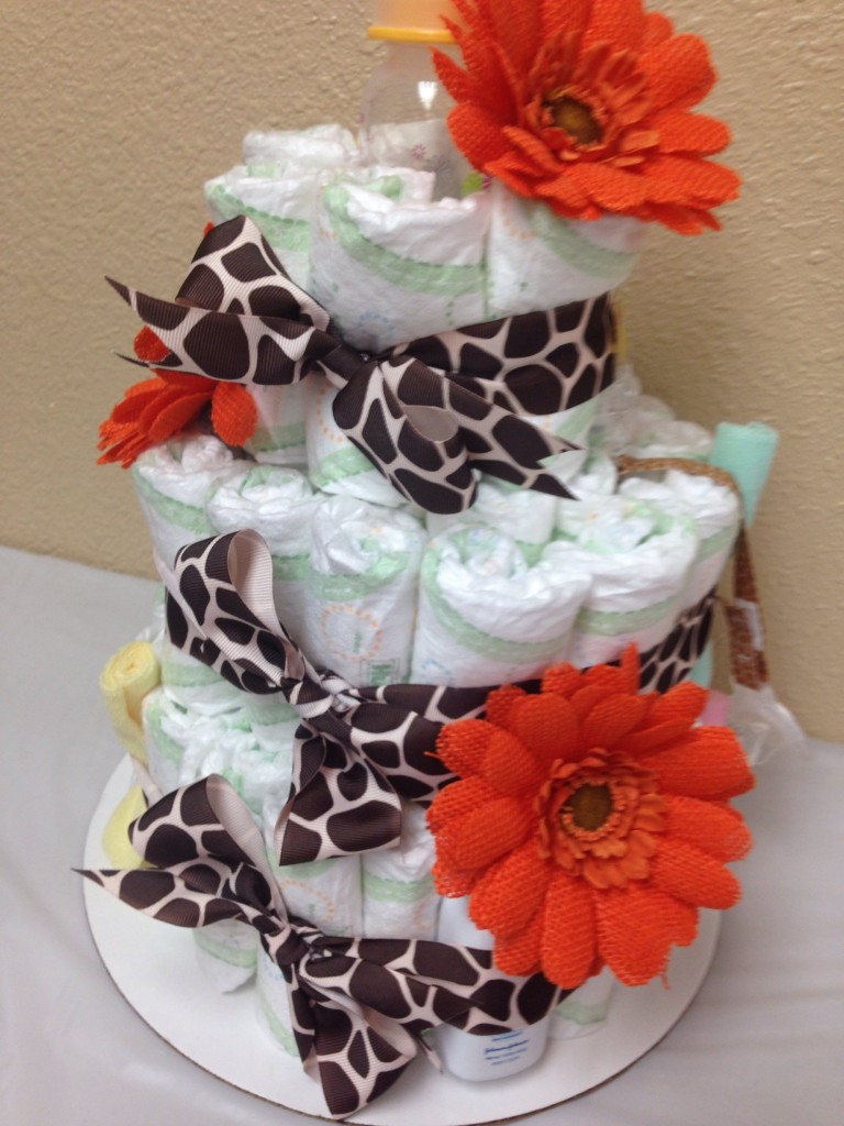 These orange burlap flowers really made the diaper cake pop!