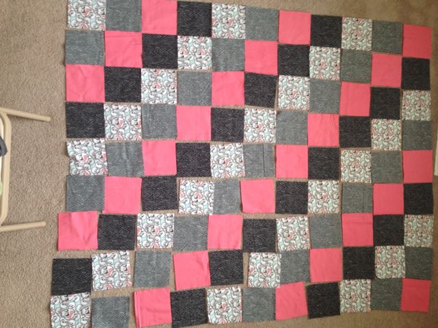 After you cut out all of your squares, you need to lay out the pattern you would like your quilt to have on the front side.