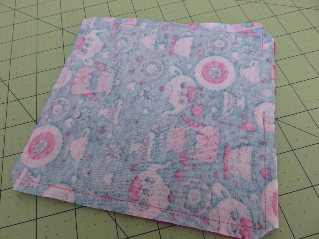 Sew two squares right sides together leaving about a 2" space on one side to turn them inside out.