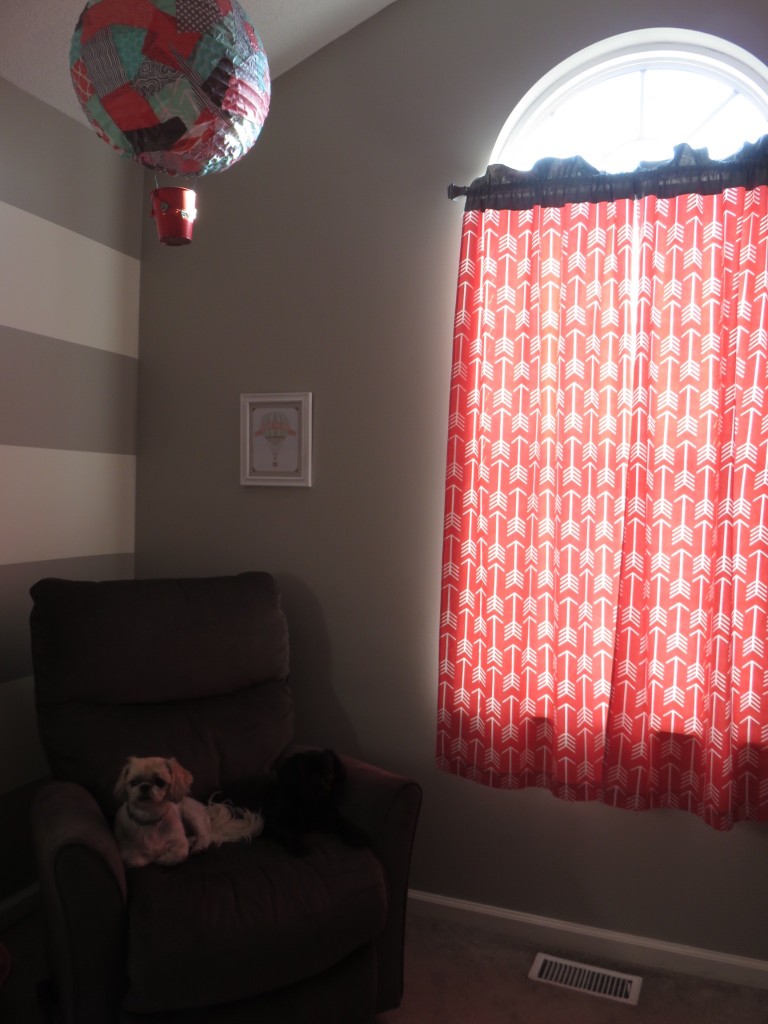 Love the coral arrow curtains we made.