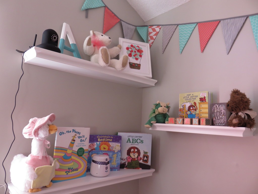 Love the shelves. We put the baby monitor camera at the top overlooking the crib. I also have my brother Karlton's 4H cow overlooking her crib. It means a lot to me to have this in her nursery.