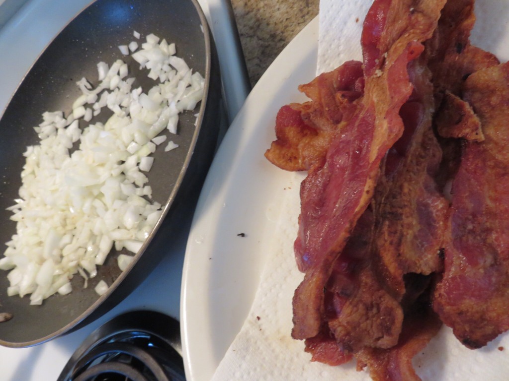 After frying the bacon, drain some of the grease. Then add the onion and sauté until tender.