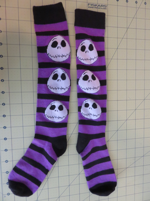 Since Halloween is right around the corner, I found some adorable Halloween socks for $5.  I did go ahead and wash them before I got started, just in case they shrinked.